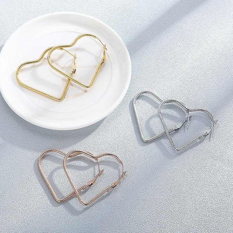 32/55mm Stainless Steel Twist Heart Hoop Earrings - kalen