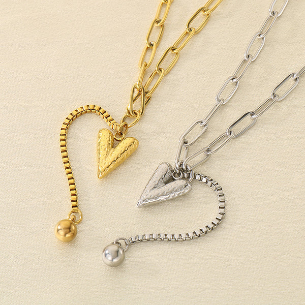 Textured Heart Pendant Tassel Necklace